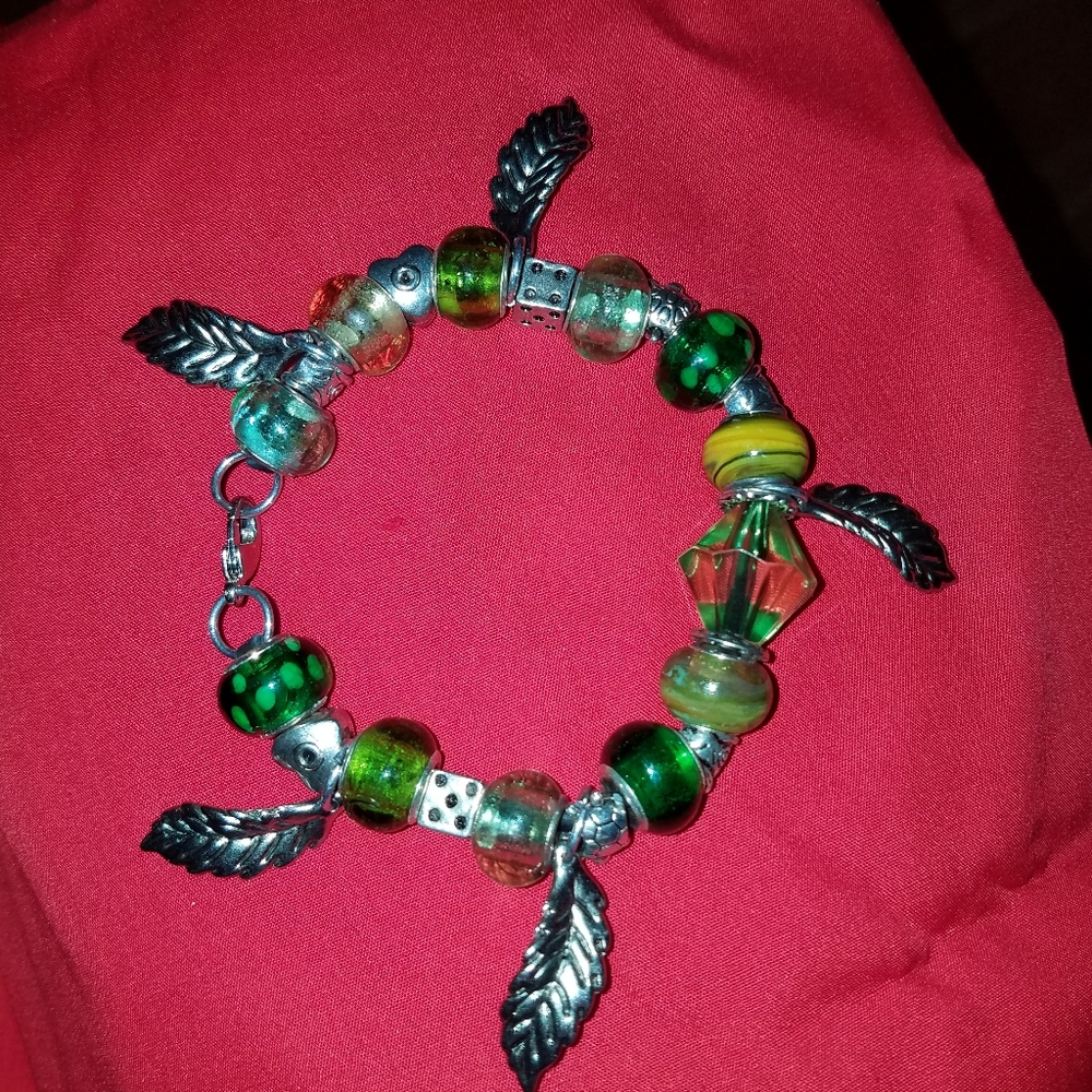 A green leaf murano charm bracelet